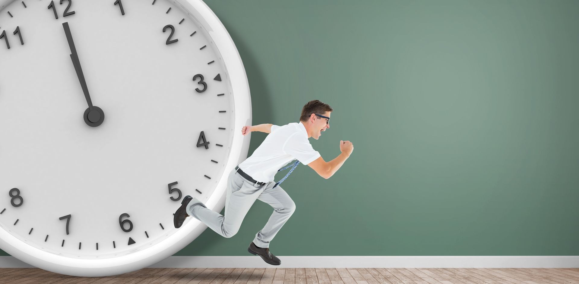 Geeky happy businessman running mid air in front of a clock